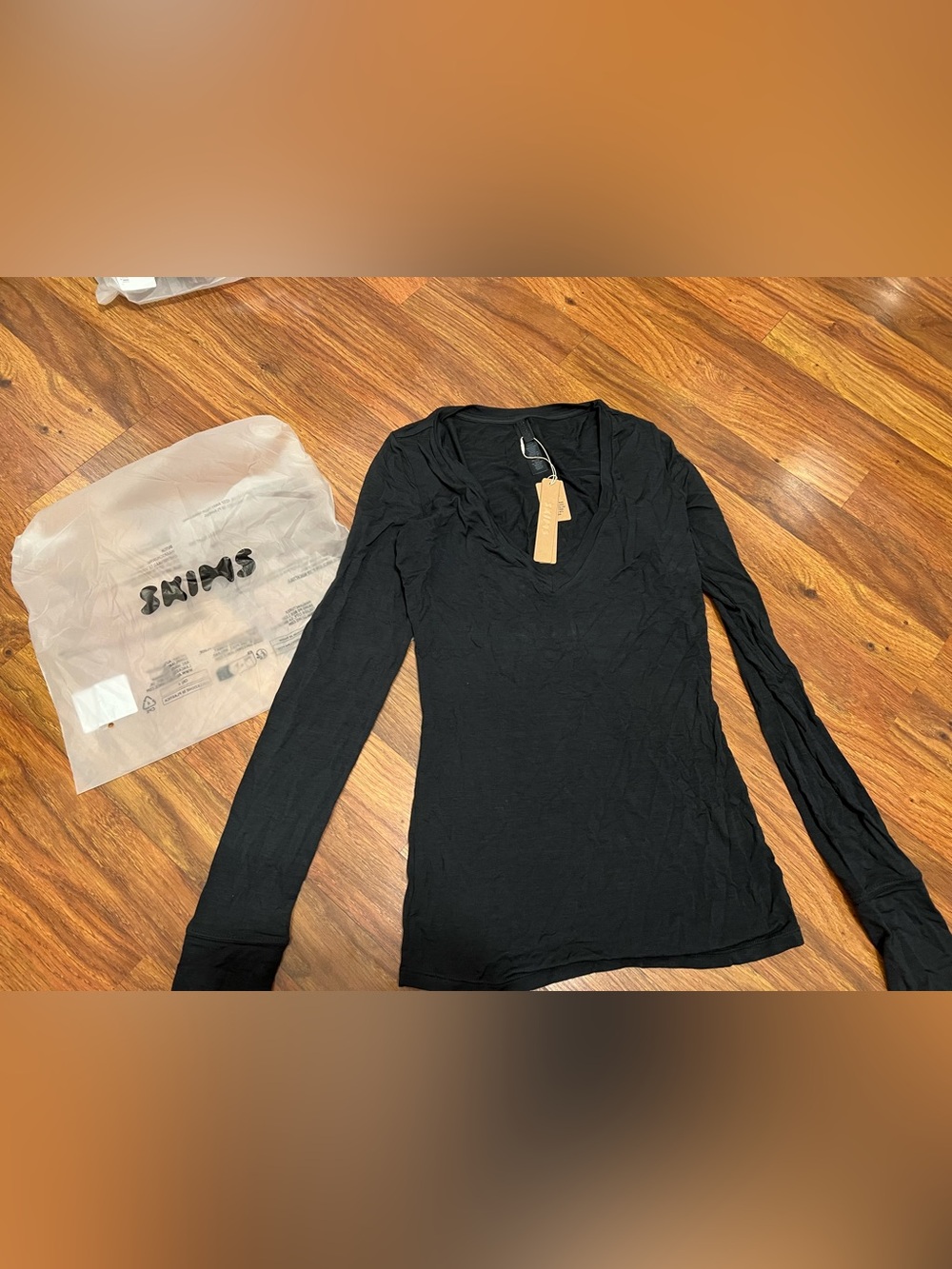 NWT SKIMS Sheer Modal long sleeve v neck color onyx (black) size small